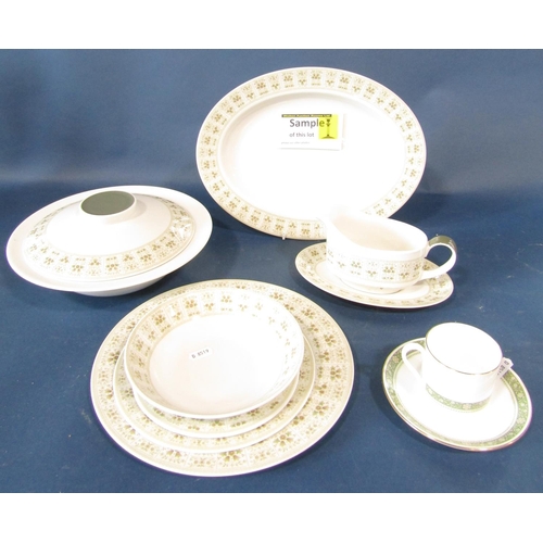 1005 - A Doulton Samarra dinner service comprising graduated plates, two tureens, open bowl, gravy boat and... 