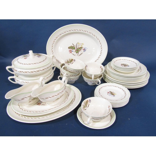 1005A - A Doulton Woodland pattern dinner service comprising dinner plates, side plates, soup bowls, stands,... 
