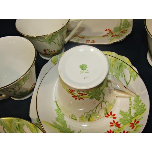 1002 - 1920s four piece tea service with typical landscape detail, together with a further continental tea ... 