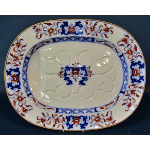 1046 - An ironstone jug and basin, the jug with serpent handle, together with a large Victorian meat plate ... 