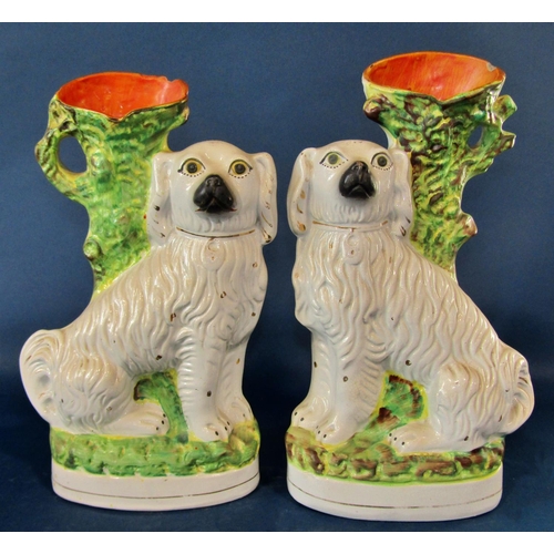 1050 - A pair of 19th century spaniel vases, further pair of spaniels, a ceramic fox with shard detail, pai... 