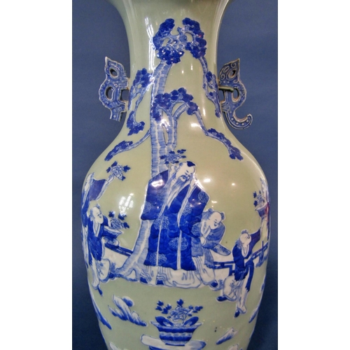 1060 - A large 19th century Chinese underglaze blue and white slip decoration celadon ground vase, sage and... 