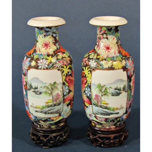 1070 - Pair of Chinese famille rose vases, Republic period, with black ground mille fleur decoration and la... 