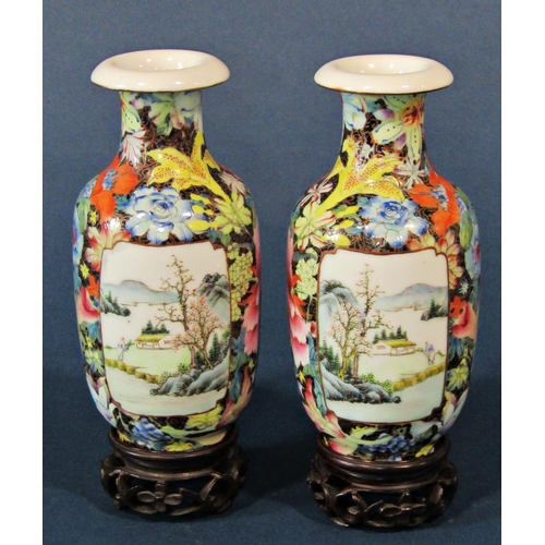 1070 - Pair of Chinese famille rose vases, Republic period, with black ground mille fleur decoration and la... 