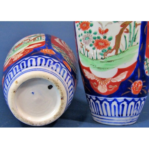 1073 - A pair of 19th century Imari shouldered vases with typical landscape and foliate detail, 25cm high