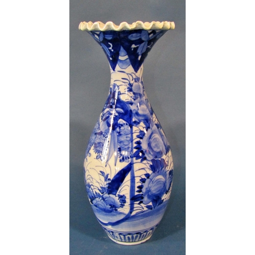 1075 - A Japanese vase with pinched neck and fluted rim, together with a 19th century German vase with repe... 