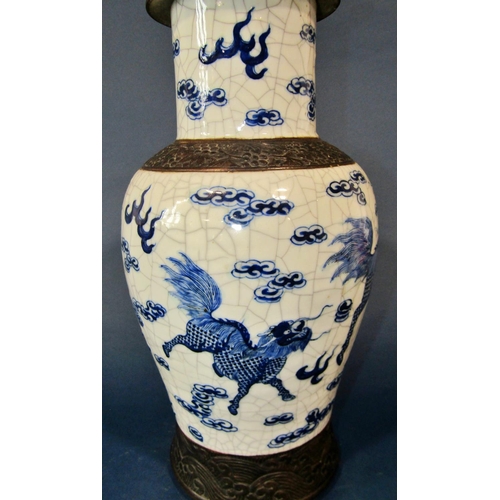 1085 - A crackle glazed vase with lion, cloud and other detail, with cover, 46cm high