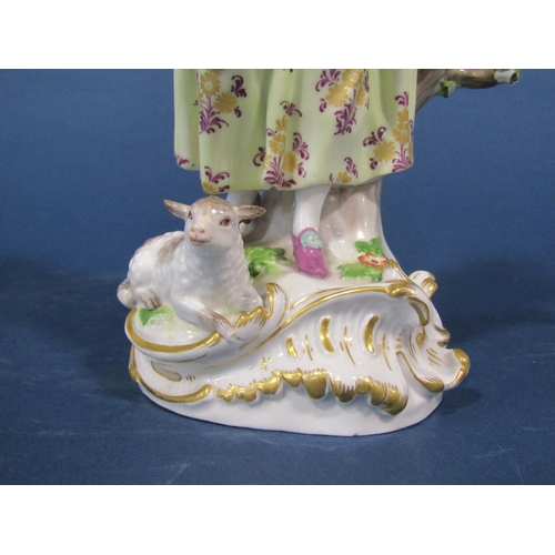 1122 - A pair of 19th century Meissen figures of a shepherd and shepherdess in 18th century dress, 26cm hig... 