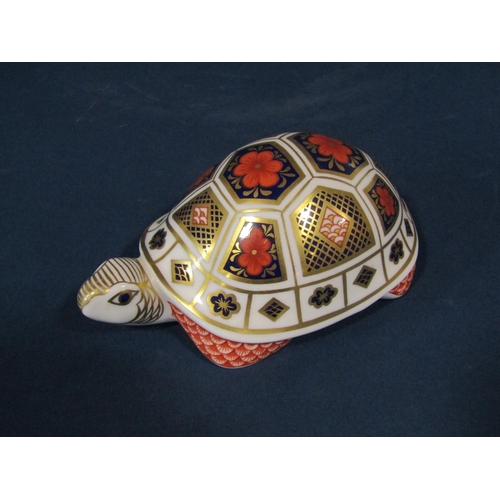 1128 - Three pieces of Crown Derby Imari comprising a cat, a tortoise and a pin dish