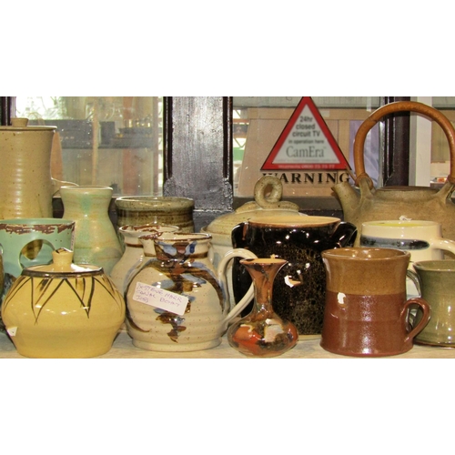 1159 - A large collection of studio pottery ware by Steven Marr, Pierre Brayford, Robert Tinnyynt and other... 