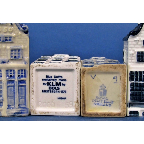 1175 - A collection of thirteen delft model Amsterdam houses in the form of flasks, ex-KLM Airlines