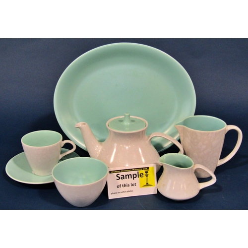 1190 - A large collection of Poole Pottery ware in green with mushroom coloured examples to include coffee ... 