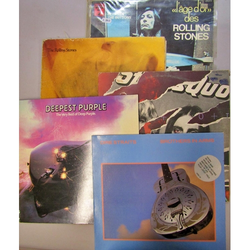 291 - A collection of vinyl LP's including Joe Cocker, Status Quo, Joe Jackson, Deep Purple, Alice Cooper,... 