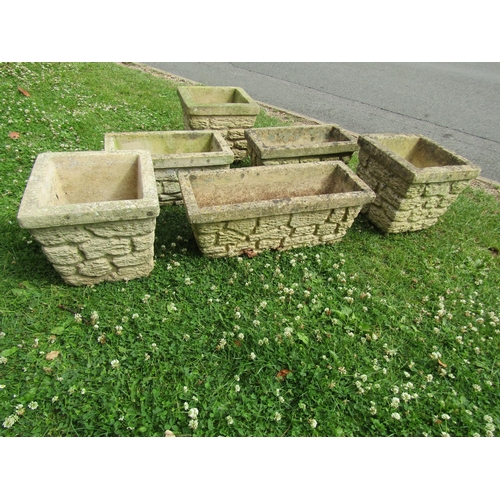 2006 - Six weathered cast composition stone mock stone wall effect planters of varying shape and size, stam... 