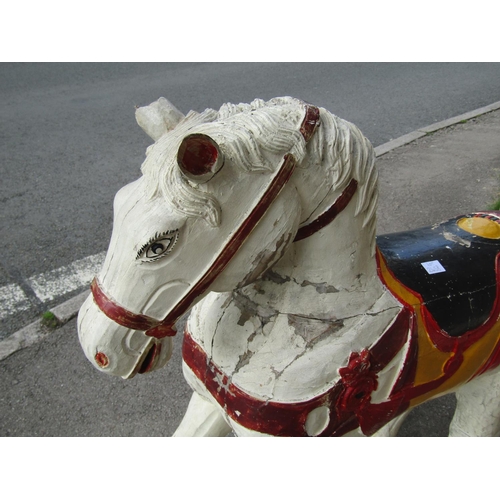 2114 - A antique continental carved wooden rocking horse with painted finish 138cm l x 100cm high (possibly... 