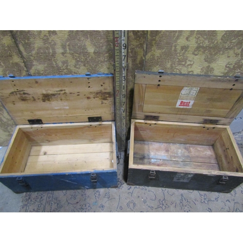 2147 - Two vintage timber travelling trunks with steel fittings, three vintage suitcases, together with a v... 