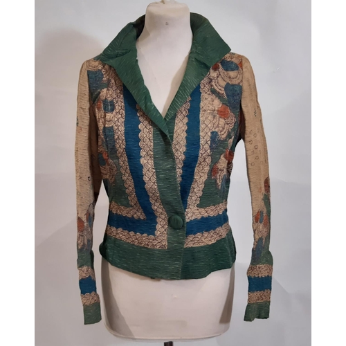 553 - Large collection of mid 20th century clothing and fabric remnants contained in a lead lined wooden t... 