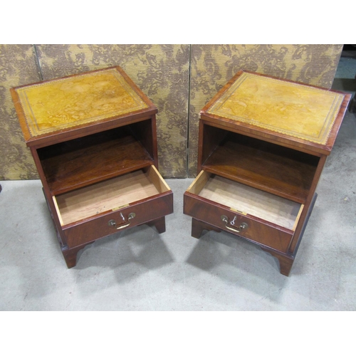 2208 - A pair of Georgian style side tables with inset leather tops, front elevation partially enclosed by ... 