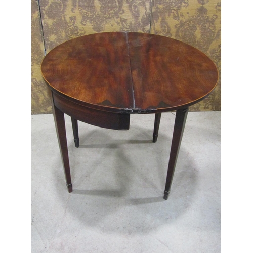 2236 - Georgian mahogany demi-lune fold over top tea table on square taper legs 81 cm diameter