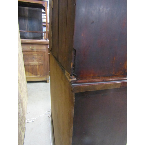 2258 - A small Victorian mahogany library bookcase, the lower section enclosed by two panelled doors and a ... 