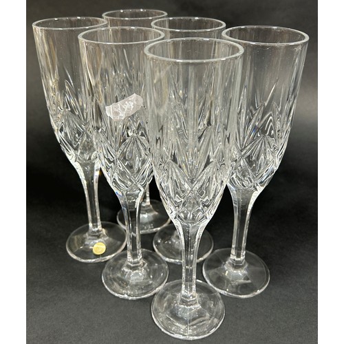 1238 - Six slender cut glass champagne flutes, six similar wine glasses, other various matching wines, etc