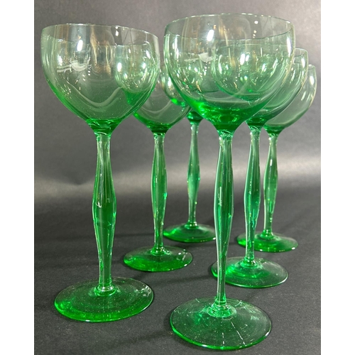 1215 - Six slender green hock wine glasses, 195cm high