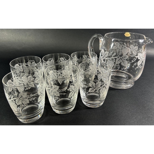 1239 - collection of mid-20th century Stuart Crystal glasses including a vine leaf decorated jug and six tu... 