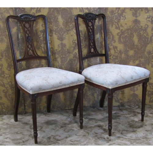 2330 - A pair of good quality Edwardian mahogany side chairs with carved and pierced splats, upholstered se... 