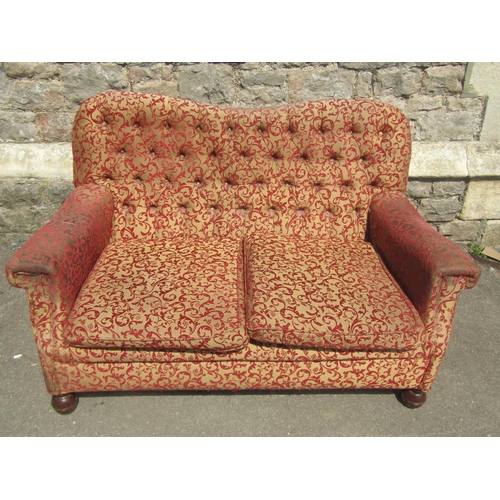 2331 - An Edwardian button back drawing room sofa of small proportions 130 cm wide together with a chair in... 