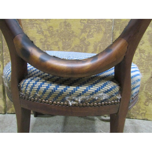 2342 - A Georgian mahogany chair frame with cameo back, open arms, serpentine seat on cabriole forelegs wit... 