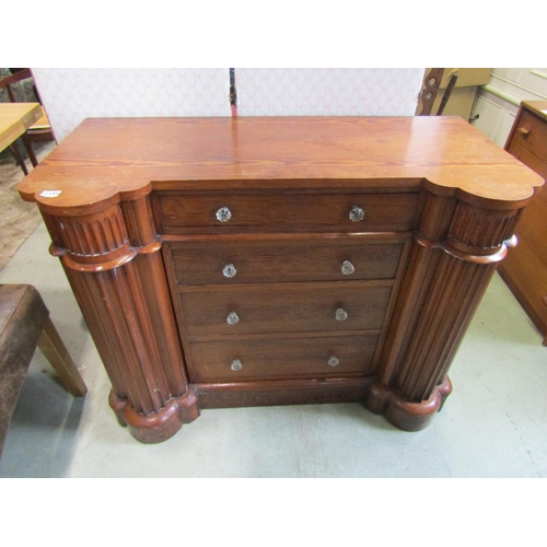 2287 - An unusual Victorian pitch pine chest of four drawers flanked by a pair of pronounced fluted columns... 