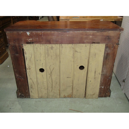 2287 - An unusual Victorian pitch pine chest of four drawers flanked by a pair of pronounced fluted columns... 