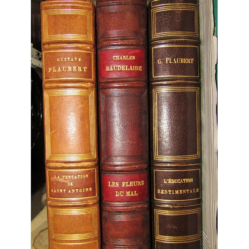 224 - Mixed Interest - to include three leather bound works, two by Gustave Flaubert, The Economics of Tas... 