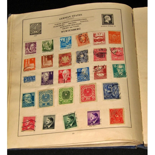 270 - The Strand stamp album containing a worldwide collection of stamps mainly George VI and later