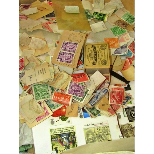 275 - A very large volume of stamps, worldwide, loose, packets, envelopes, tins, etc, unsorted, 1000's and... 