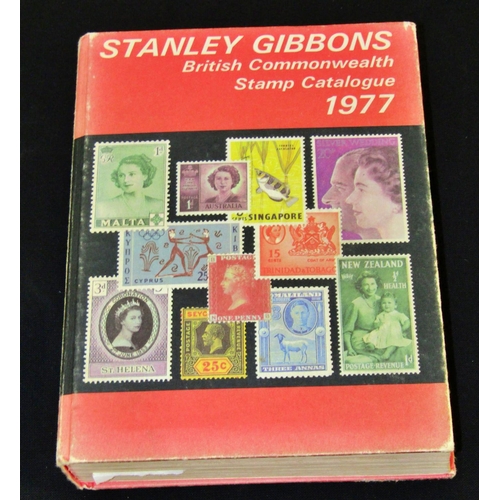 280 - A vintage suitcase containing an album of worldwide stamps, early 20th century to mid 20th century (... 