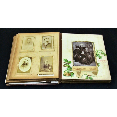 284 - A Victorian crescent shaped photograph album and three other albums, together with a collection of f... 