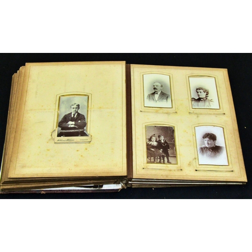 284 - A Victorian crescent shaped photograph album and three other albums, together with a collection of f... 