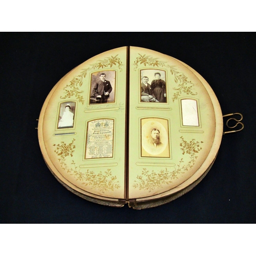 284 - A Victorian crescent shaped photograph album and three other albums, together with a collection of f... 