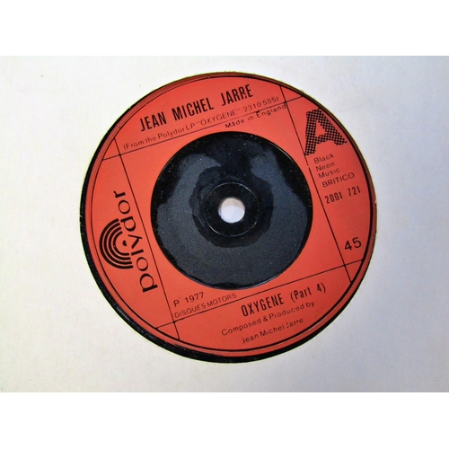 293 - A quantity of 45rpm singles (200 approx) together with a collection of Manchester United 'United Rev... 