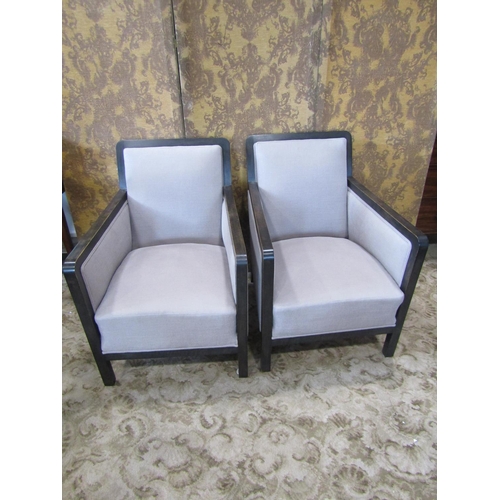 2366 - A pair of Art Deco style drawing room chairs with ebonised frames and upholstered finish