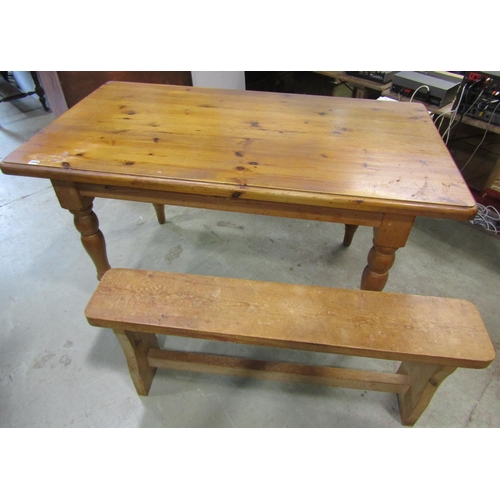 2381 - A pine farmhouse kitchen table, 83 cm high x 152 x 84 cm together with an associated pale pine refec... 