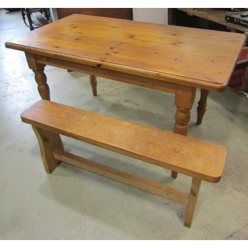 2381 - A pine farmhouse kitchen table, 83 cm high x 152 x 84 cm together with an associated pale pine refec... 