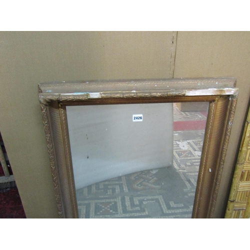 2409 - Three various wall mirrors, the largest (unframed) of arched form 107 cm x 61 cm (3)