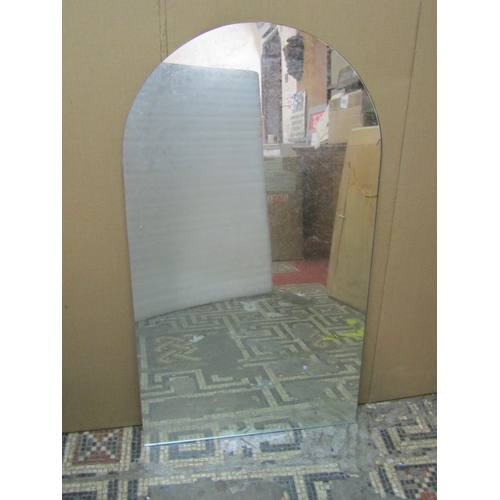 2409 - Three various wall mirrors, the largest (unframed) of arched form 107 cm x 61 cm (3)