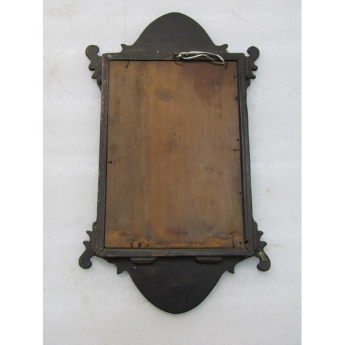 2410 - A miniature fret cut mahogany wall mirror in the Queen Anne style, 46 cm x 27 cm