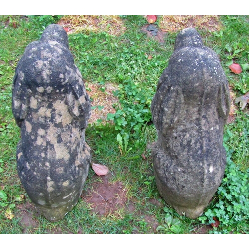 2078 - A pair of nicely weathered cast composition stone garden ornaments in the form of seated spaniels, 5... 