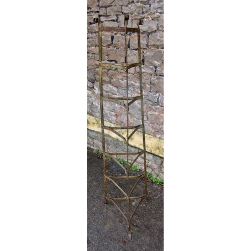 2088 - A vintage steel floor standing seven tier graduated saucepan stand, 148cm high