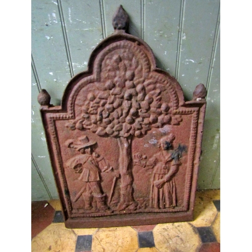 2090 - A cast iron fire back of stepped arched form with raised relief detail, 48cm wide x 72cm high, toget... 