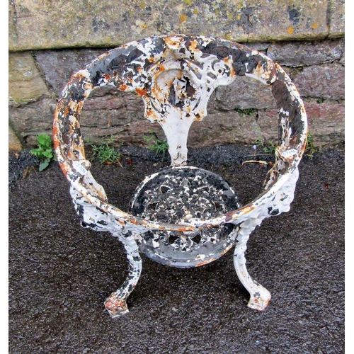 2093 - An over painted and weathered cast iron pub table base of circular form with swept supports, female ... 